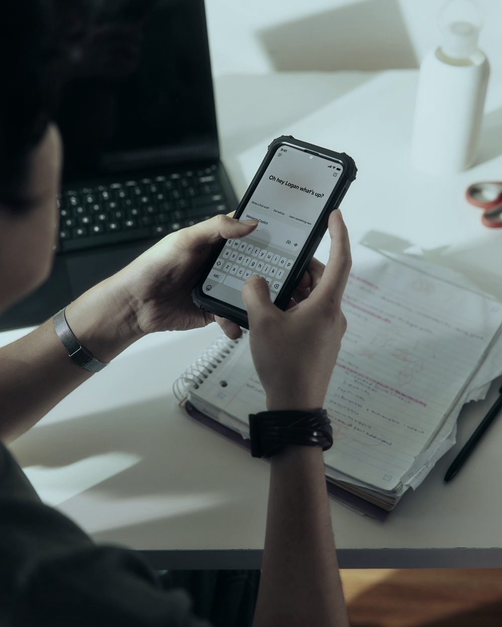 A person using an AI assistant on their phone